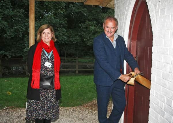 DM19100624a.jpg. The official opening of the Newdigate Bakehouse and Eastwick Park Dairy at the Weald and Downland Museum. Hugh Bonneville opens the dairy accompanied by Jo Pasricha, chairman of the trustees. Photo by Derek Martin Photography. SUS-190310-214905008