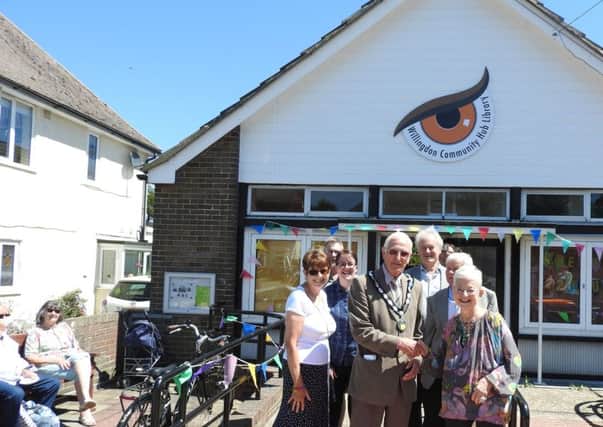 Dame Jacqueline Wilson with Chairman John Pritchett and members of the Willingdon Residents Association at the opening of Willingdon Library SUS-190627-090620001