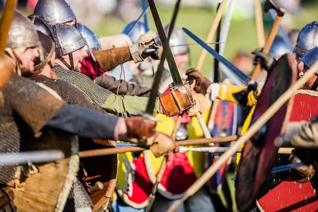 Battle of Hastings re-enactment. Photo courtesy of English Heritage. SUS-190410-105825001