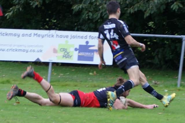 Heath secured the extra bonus point running in seven tries and securing one penalty try at Whitemans Green