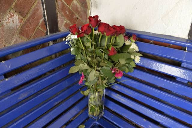 Floral tributes at the Seafront Shelter where Tracy Patsalides died (Photo by Jon Rigby)