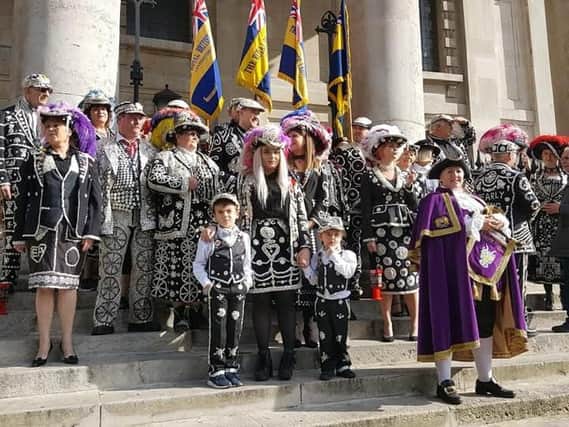 Jane Smith (in purple) with the Pearly Kings and Queens outside the church.
Picture courtesy of the Pearly Kings and Queens.