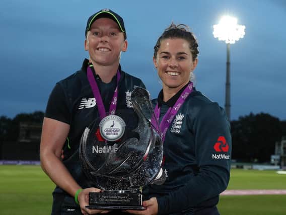 England captain Heather Knight (left) and Tammy Beaumont were among the players to surprise the young Hastings player. Picture by Getty Images