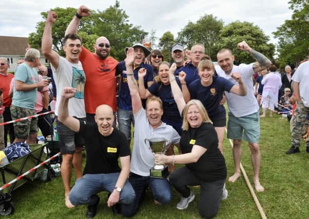 The East Preston Festival 2019. A closely fought tug of war was won by the team from the Tudor Tavern. SUS-191206-105203001