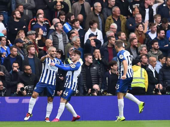 Brighton and Hove Albion striker Neal Maupay celebrates with Aaron Connolly at the Amex Stadium during their 3-0 win against Tottenham Hotspur