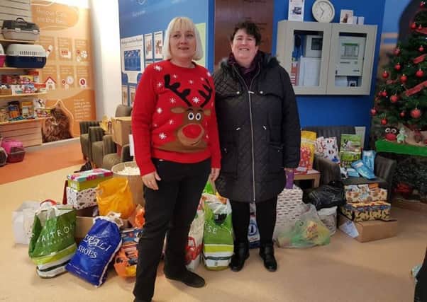 Justine Crookall (right) from Burgess Hill is appealing for festive donations