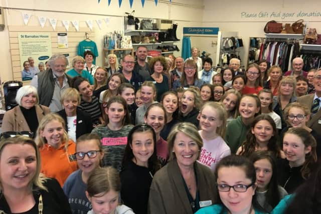 The St Barnabas House shop in Wick, packed with guests for the 20th birthday party