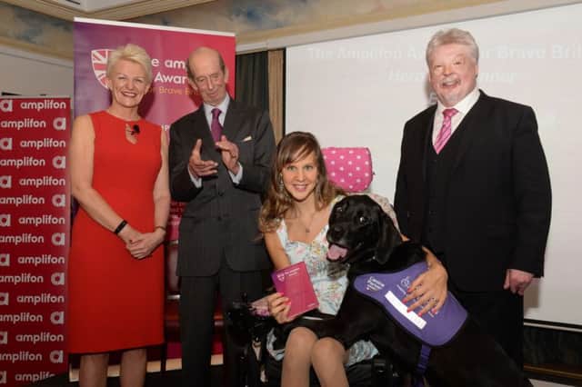 Ethan and owner Sally Whitney with, from left to right, Paula Cave, CEO of Amplifon UK and Ireland, the Duke of Kent, and Falklands War hero Simon Weston. Photo by Tim Bradley Photography.