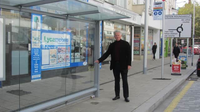 Councillor Robert Smart by the Terminus Road bus stop