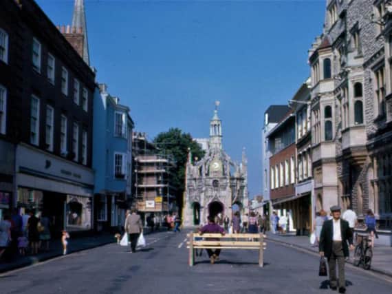 East Street in 1975 during the 'experimental phase of the pedestrianisation' Vehicles have been excluded but the carriageway and pavements remains. Alan Green said the bench was placed to 'reassure the nervous'. This was the major initiative to be adopted from the study, and was made permanent in 1976.