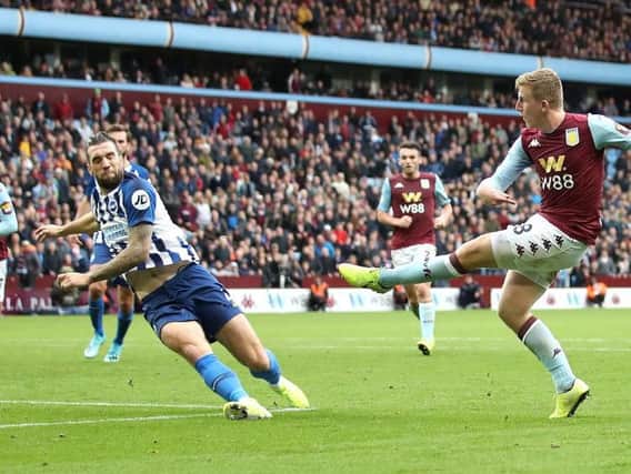 Aston Villa's Matt Targett fires home the late winner despite Shane Duffy's best efforts