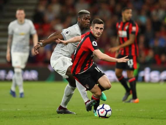 Bournemouth midfielder Lewis Cook is admired by the Premier League giants