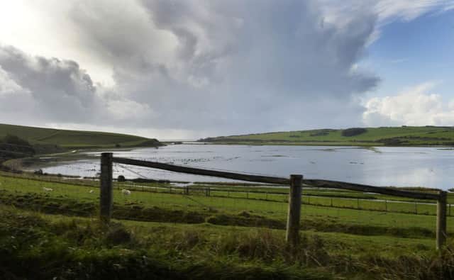 Cuckmere River flooding (Photo by Jon Rigby) SUS-191021-100041001