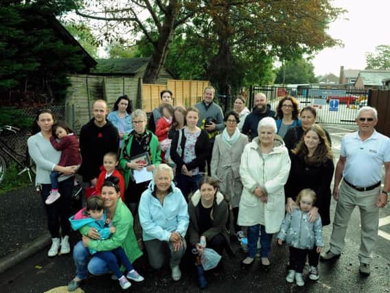 'Concerned and shocked' residents, past and present parents and former students of Rumboldswhyke school have rallied against the closure proposal. Photo: Kate Shemilt