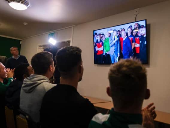 City players watch as Chi boss Miles Rutherford gives his pre-cup draw views on BBC2 / Picture by Daniel Harker