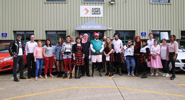 Staff at Aspen Pumps, Hailsham, wore it pink (and punk) on Friday to raise funds for Breast Cancer Now