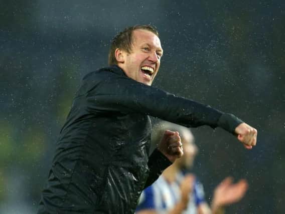 Brighton and Hove Albion manager Graham Potter celebrates victory against Everton