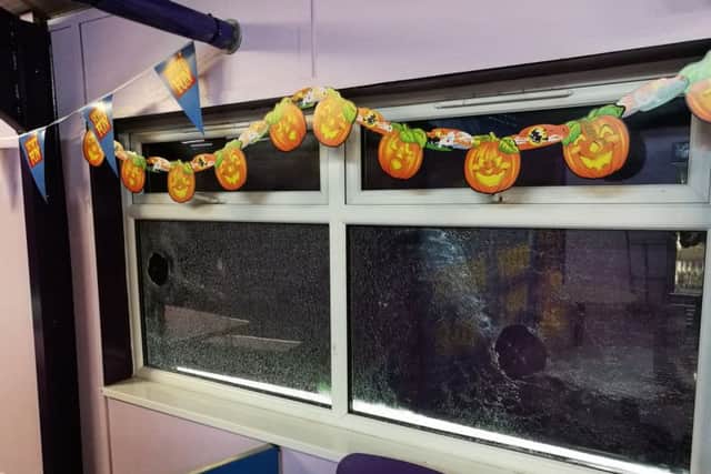 Four windows were smashed by vandals