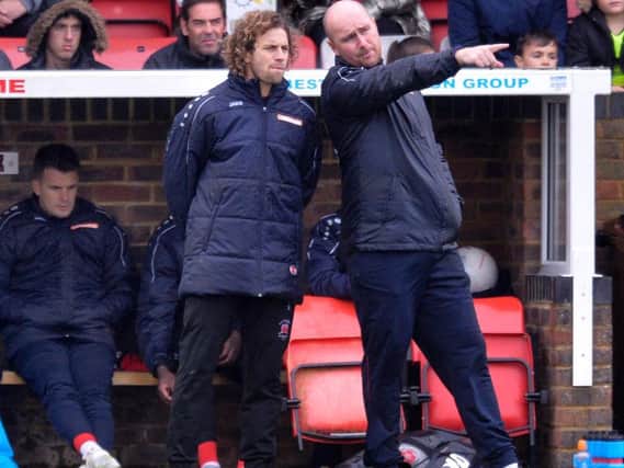 Sergio Torres (left) took charge for the first time as Caretaker Manager in the defeat. Photo by Jon Rigby