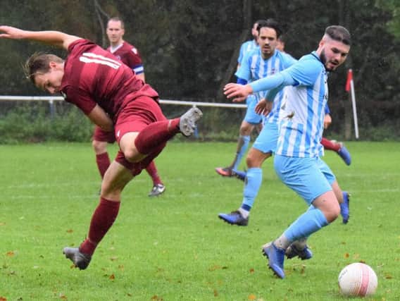 Matt Rodrigues-Barbosa (right) in action for AFC Uckfield against Little Common in the Peter Bentley Cup. Picture by Mike Skinner
