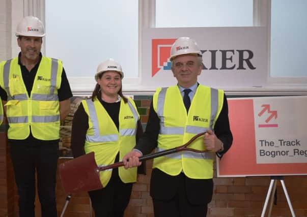 Construction of a new, creative digital hub, called The Track, has started in Bognor Regis. From right to left, county council cabinet member Bob Lanzer, Aecom project manager Bronwen Byng and Kier site manager Ty Donat SUS-191111-113713001