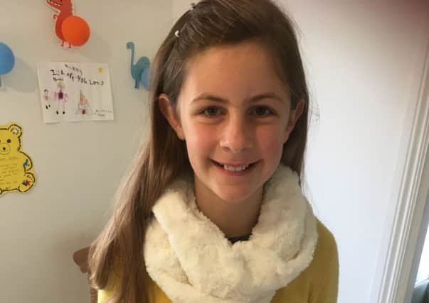 Young entrepreneur, Alice Dryden, who made Halloween keyrings for Cancer Research