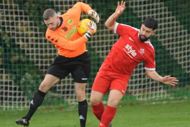 Westfield goalkeeper Jon Gardner claiming the ball in the Saturday's match. Picture by Justin Lycett