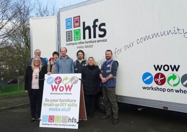 Hastings Mayor Judy Rogers with HFS staff and visitors alongside the Workshop on Wheels SUS-170221-112324001