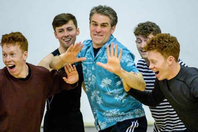 Ben Watson with the dancers. Photograph by Peter Mould