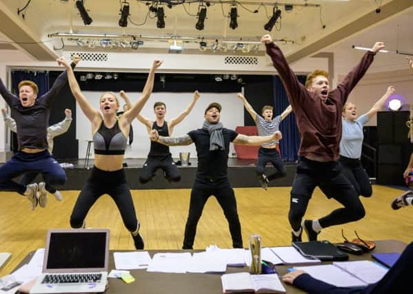 The Aladdin cast in a high-energy rehearsal. Photograph by Peter Mould