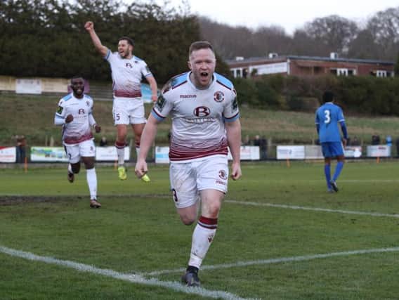 Ben Pope celebrates his goal against VCD Athletic on Saturday. Picture by Scott White