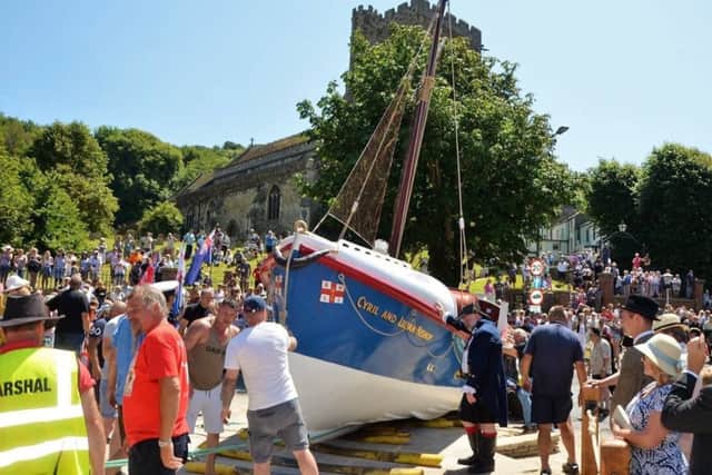 The moving of the Cyril and Lilian Bishop lifeboat to its final resting place on the corner of Harold Road/Old London Road. Photo by Sid Saunders. SUS-190406-120215001