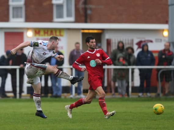 Action from Hastings United's FA Trophy win over Hythe Town. Picture by Scott White