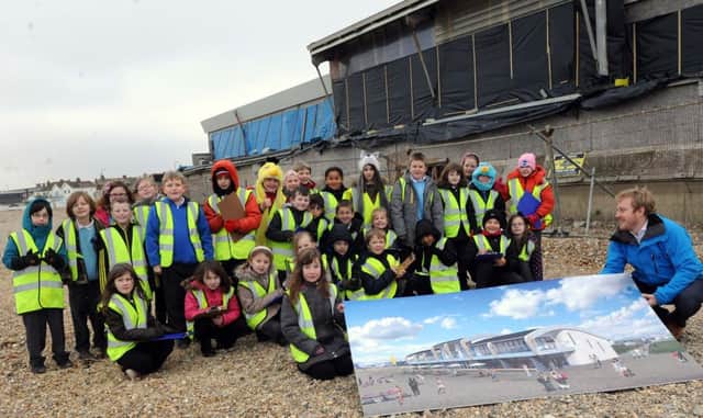 Students from Seaside Primary School with the building's owner Alex Hole