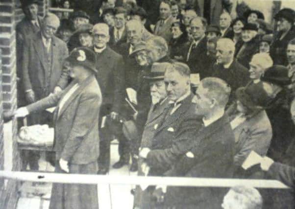 Mrs W. Ridley Chesterton laying a foundation stone at the new West Worthing Baptist Church on Wednesday, March 30, 1938