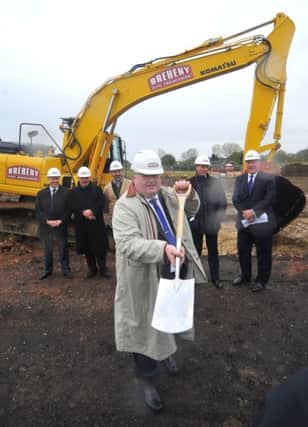 Eric Pickles cuts the turf for the new research park for Haverhill.