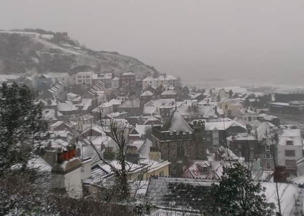 Snow scene over Hastings Old Town