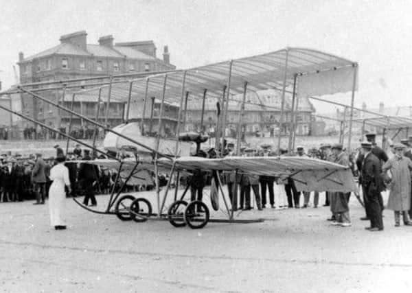 The Carlton and Beaulieu Hotels provide the backdrop to the Pashley's Farman bi-plane as the crowds of spectators build-up, May 1913.