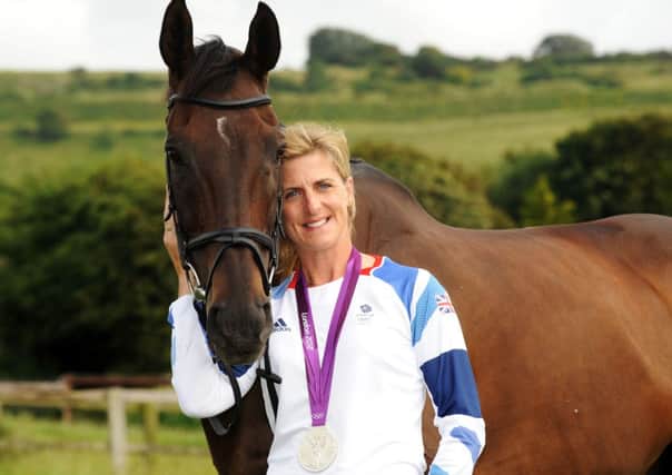 Tina Cook  080812  LP 

Silver Medal winner,Tina Cook, London 2012 Olympic Eventing Team member, with  with her horse, Miners Frolic.  Pictured with Miners Frolic at home in Findon, Sussex..