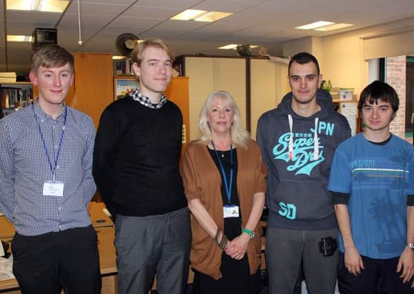 Jan English, Work Experience Co-ordinator at Horsham District Council, with four young people who have recently been working at the Council on its Work Experience programme - picture submitted