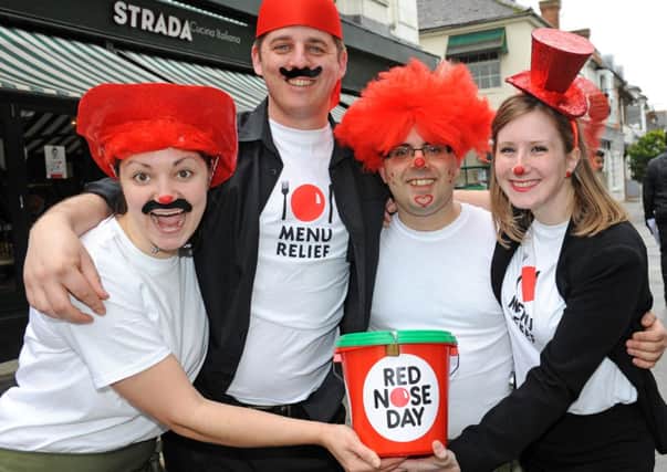 JPCT 150313 13120108x  Horsham. Strada staff fund raising for Red Nose Day, Comic Relief  -photo by Steve Cobb