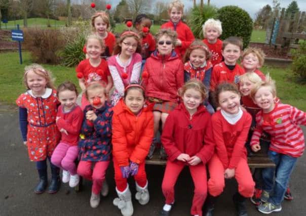 Comic Relief fun at Jessie Younghusband School in Chichester - children from Key Stage 1 all dressed up in their red clothes and they donated Â£1 for the privilege.
