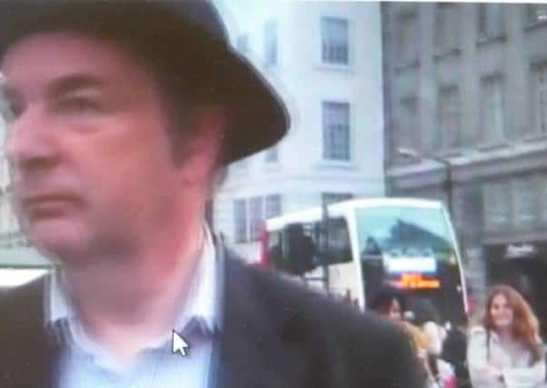 A still from Norman Baker's video at Piccadilly Circus.
The video appears on Youtube