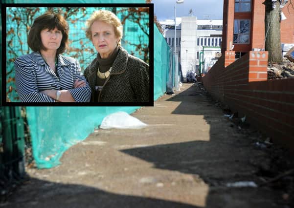 Angela O'Hara (Head) and Jane Billings (Chair of governors) of St Wilfrids School, Burgess Hill (inset) by a section of footpath needing repairs no council will own up to owning