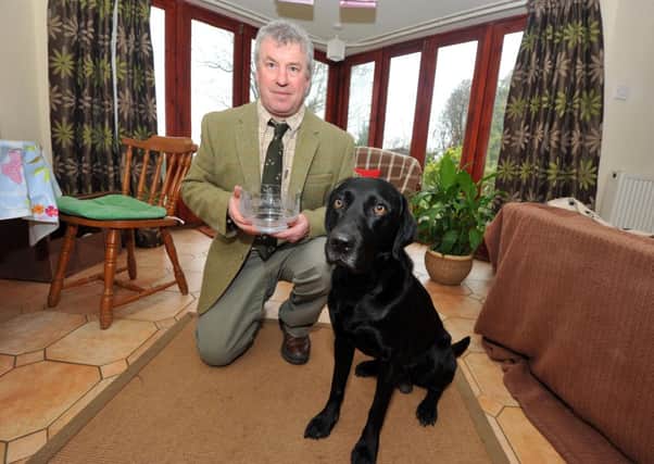 20/3/13- Willie Wicking, from Rye with Harvey who won the BASC Best Scurry award at Crufts.