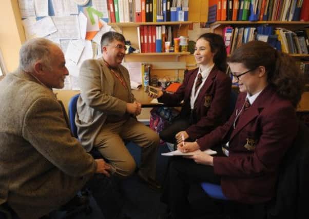 Jounalists for the day - Barnham Parish Council's David Phillips and Eastergate Parish Council's Chris Allington interviewed by St Philip Howard Catholic High School's Amy Clayton and Bibi Jones.  C130408-2