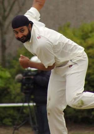 Monty Panesar bowling for Bexhill back in 2010