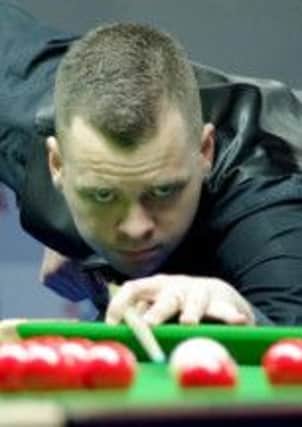 Jimmy Robertson at the table in the China Open. Picture by Tai Chengzhe