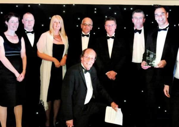 Ian Bayley and the team from Express Food Service who won the Overall Business of the Year and Medium Business Awards at last year's ceremony.