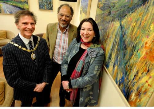 Gallery 16 has opened at The Dolphin Centre in Haywards Heath. Mayor John Sabin, Nigel Ryan, and artist Lorna Holdcroft infront of some of her work. Photo Steve Robards